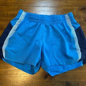 Athleta girl running shorts blue size L 12